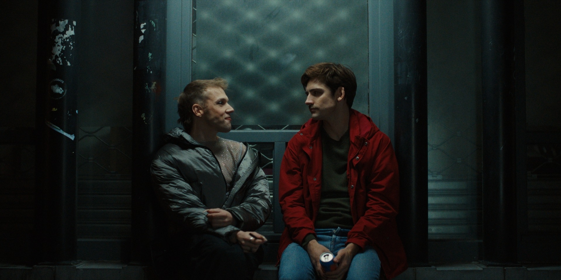 Two characters sitting together outside at night in Oh, Otto!
